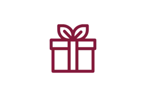 Ein minimalistisches Geschenkpaket mit einer Schleife und zwei bunten Bändern.
